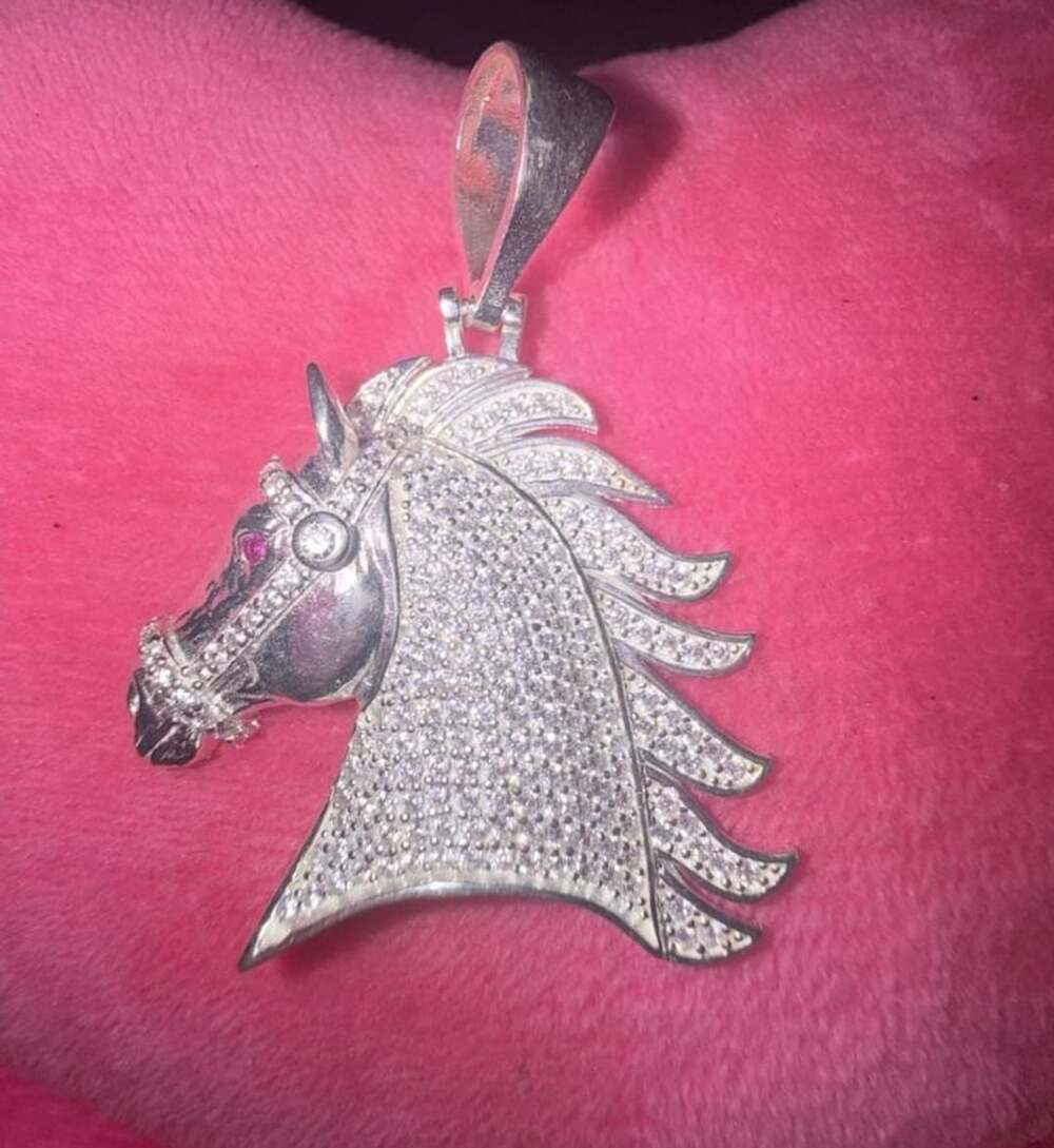Iced Out Horse Pendant with Cubic Zirconia and Ruby Eyes in 925 Silver